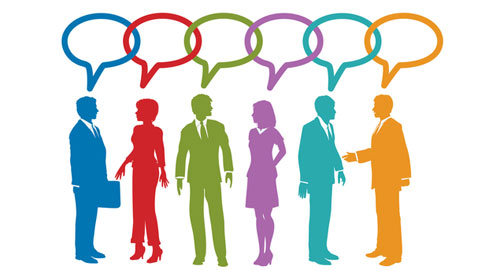 A picture of multiple different colored people engaged in conversation.