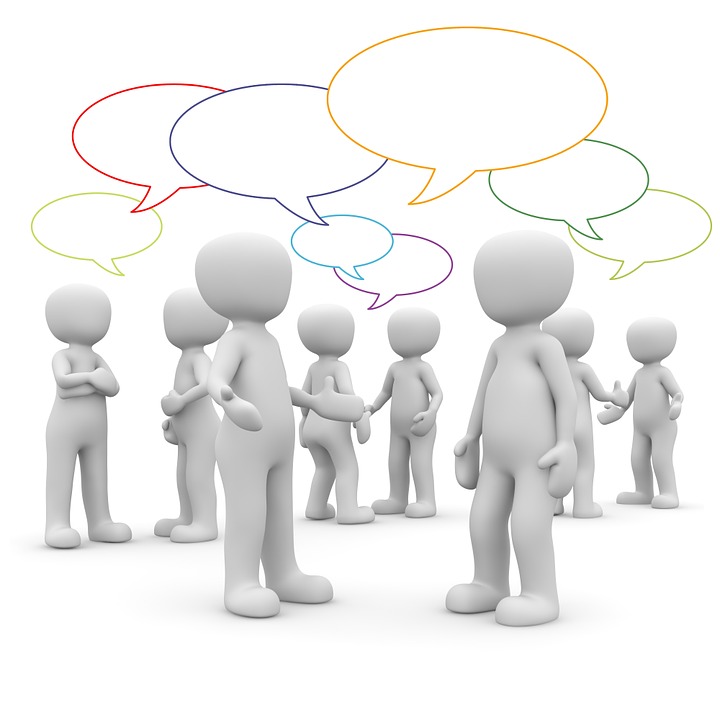 3D render of people talking to each other with different colored 2D empty speech bubbles.